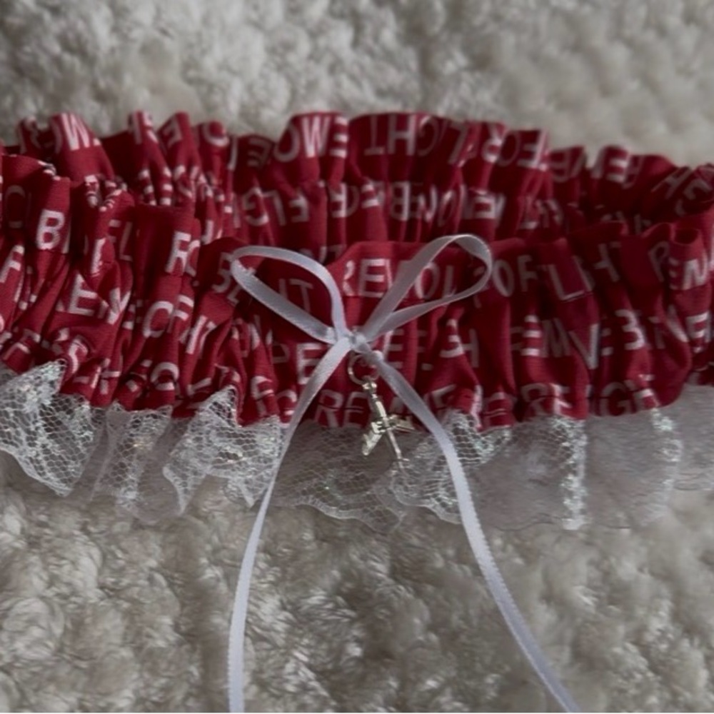 Remove before flight Lace Pilot Wedding Garter.
Extra ruffle garter-lady pilot